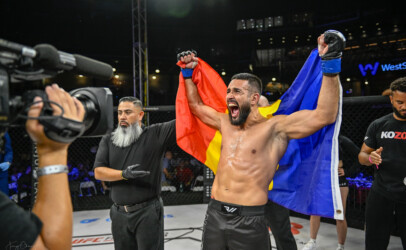 Daniel Frunza celebrating with Romanian Flag