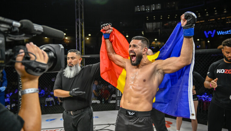 Daniel Frunza celebrating with Romanian Flag