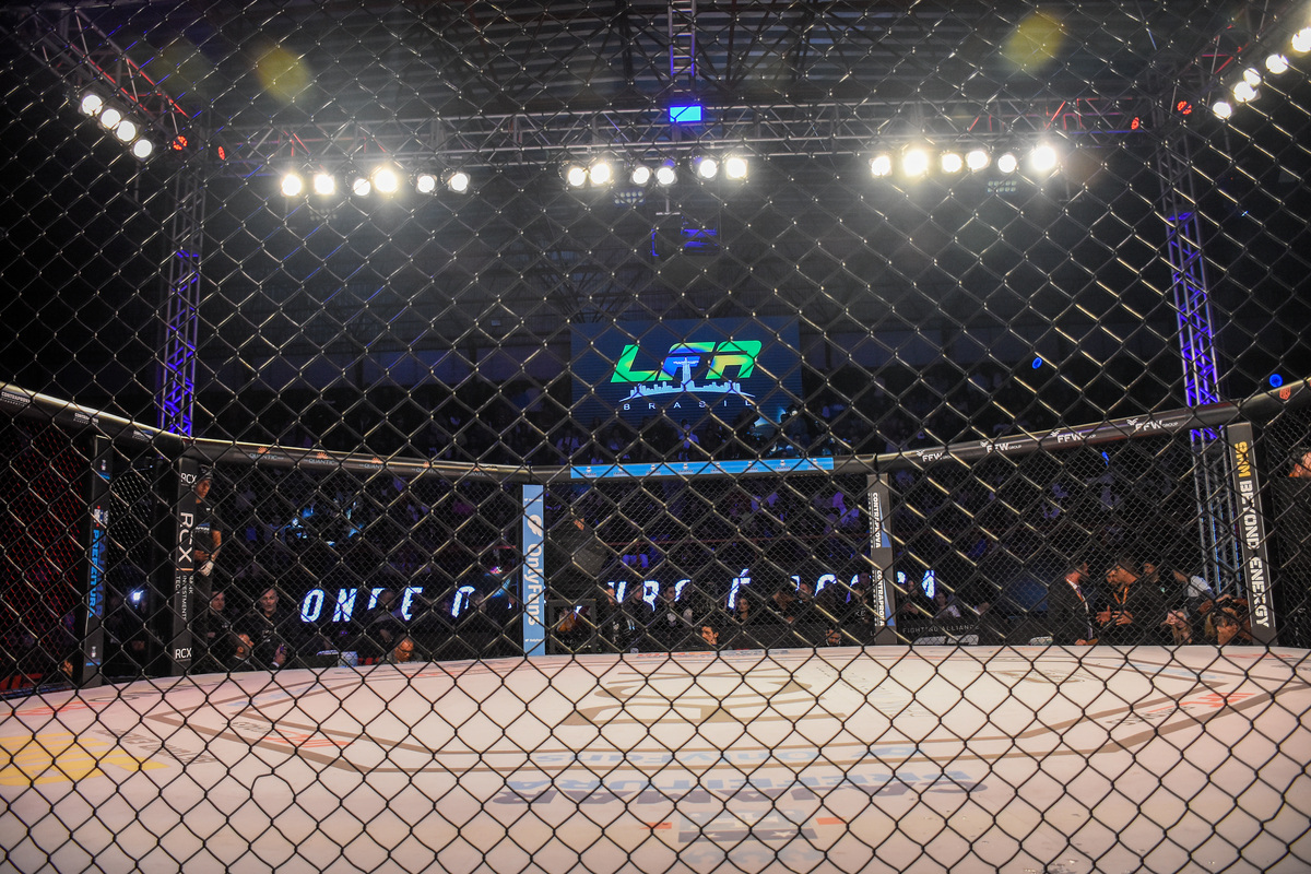 LFA Octagon cage in foreground, LFA Brasil logo in background at an event in Brazil