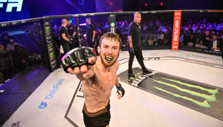 Lance Lawrence points at the camera in the heat of the moment after winning at LFA 194.